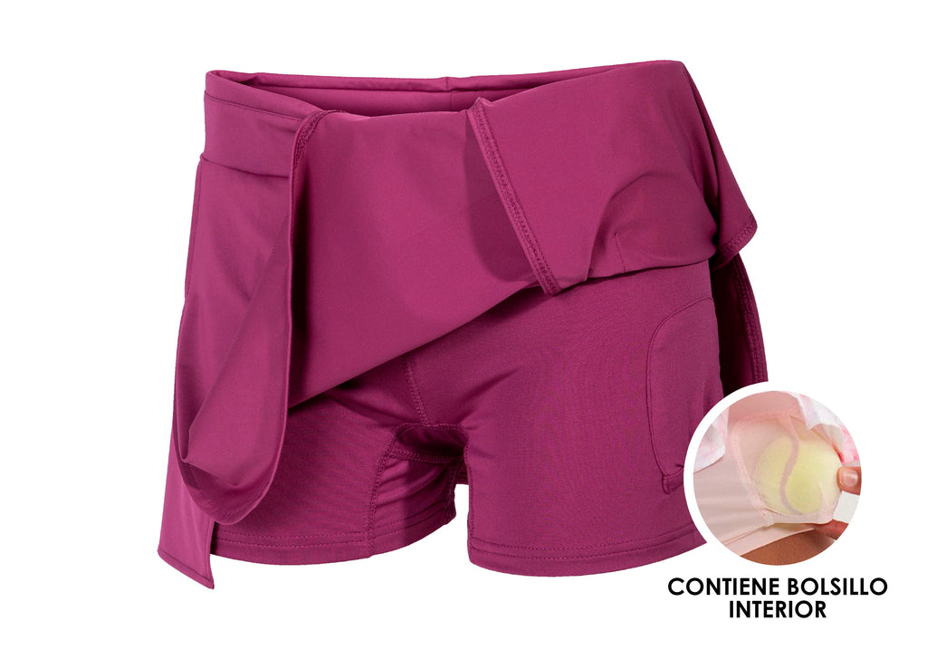 Falda Open II Fucsia - Rosa; detalle al short bajo que cuenta con almacenamiento de pelotas
